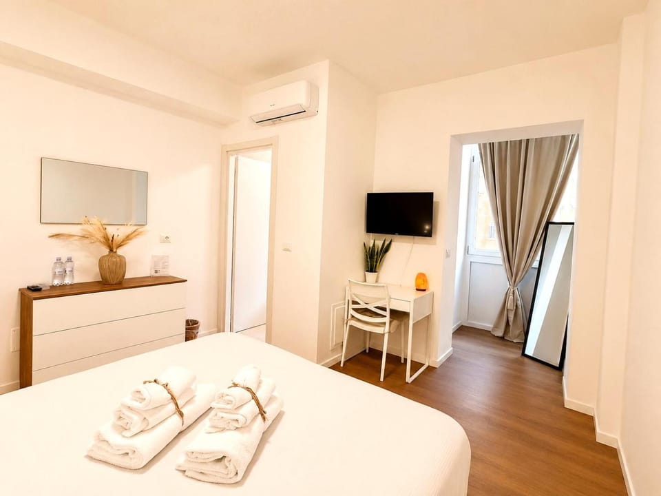 Bed, TV and multimedia, Bedroom, towels, wardrobe, air conditioner