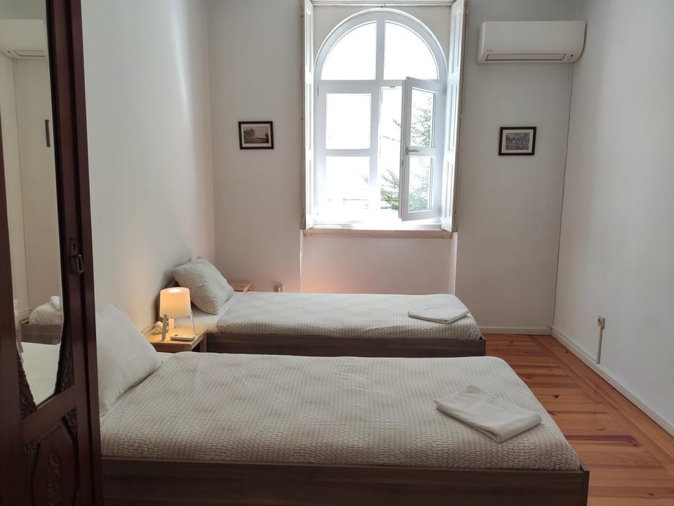 Carolina M Apartment in front of Metro House in Porto