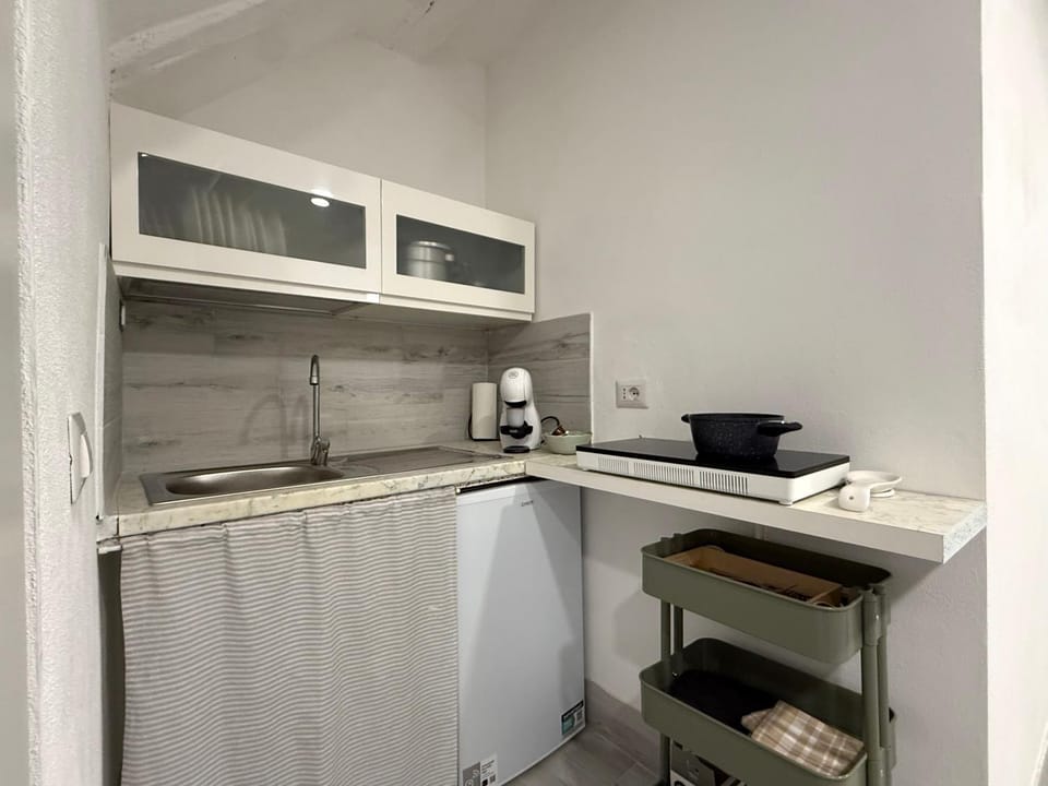 Kitchen or kitchenette, stove