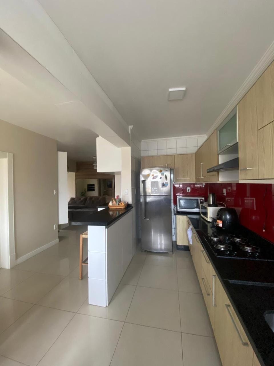 Kitchen or kitchenette, dishwasher, oven, stove