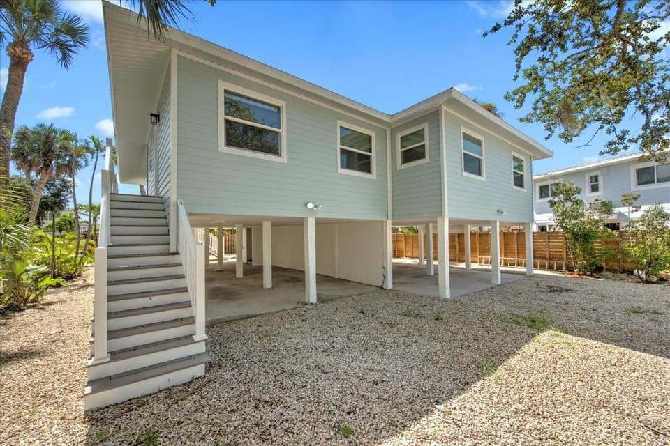 Euca Beach Breeze A by Sun Palace Vacations House in Estero Island