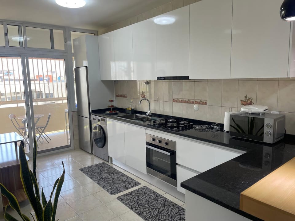 Kitchen or kitchenette, oven, stove, toaster
