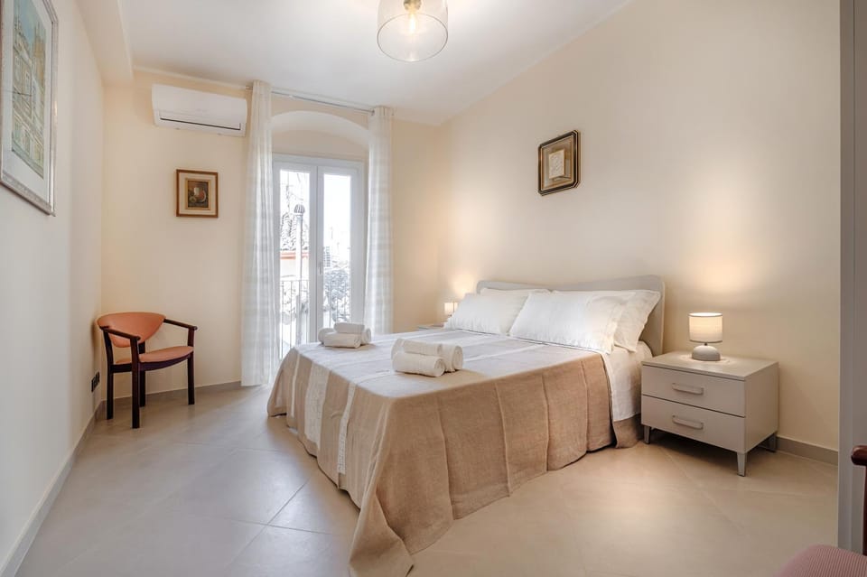 Bed, Photo of the whole room, Bedroom, towels, air conditioner