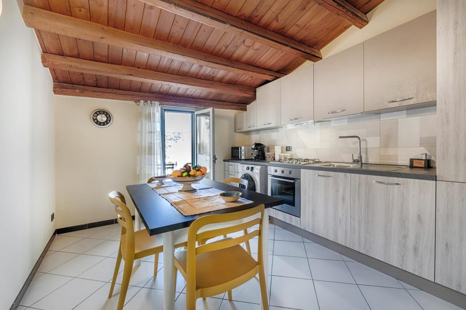Dining area, oven, washing machine, kitchen