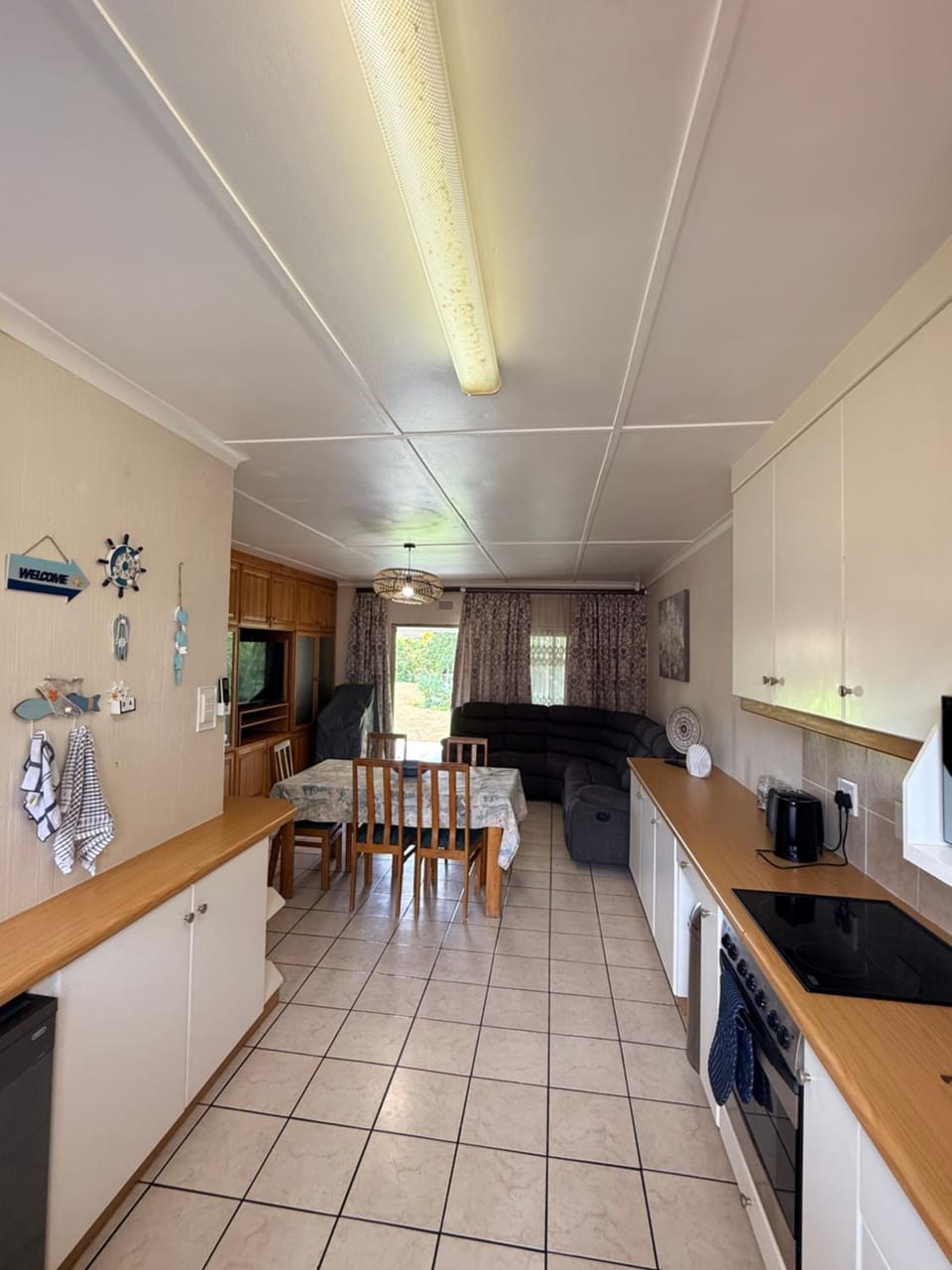 Kitchen or kitchenette, Dining area, dishwasher, stove, toaster