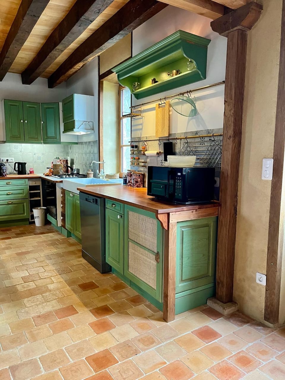 Kitchen or kitchenette, dishwasher, microwave, stove, toaster