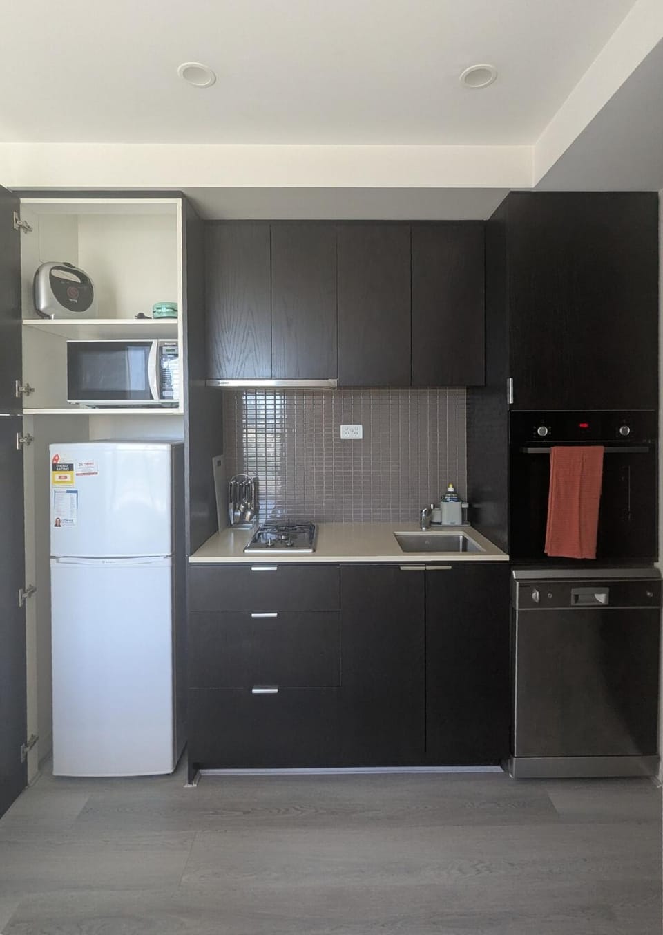 Kitchen or kitchenette, dishwasher, oven, stove, toaster