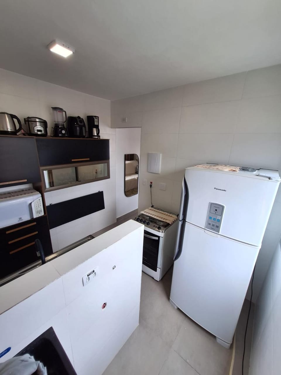 Kitchen or kitchenette, oven, stove