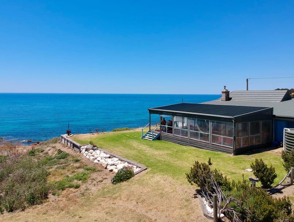Property building, Day, Natural landscape, Beach, Sea view