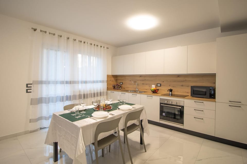 Kitchen or kitchenette, Dining area, dishwasher, oven, stove