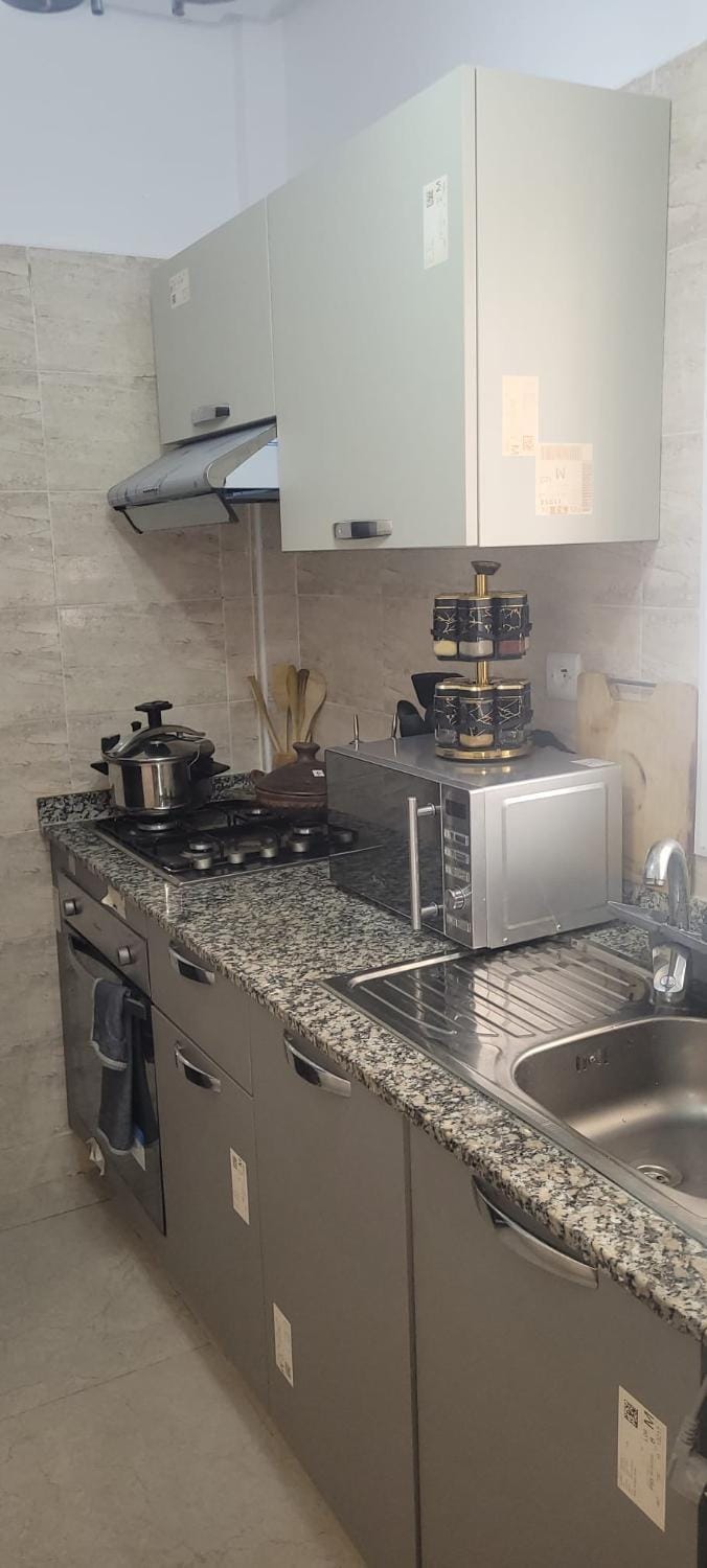 Kitchen or kitchenette, stove