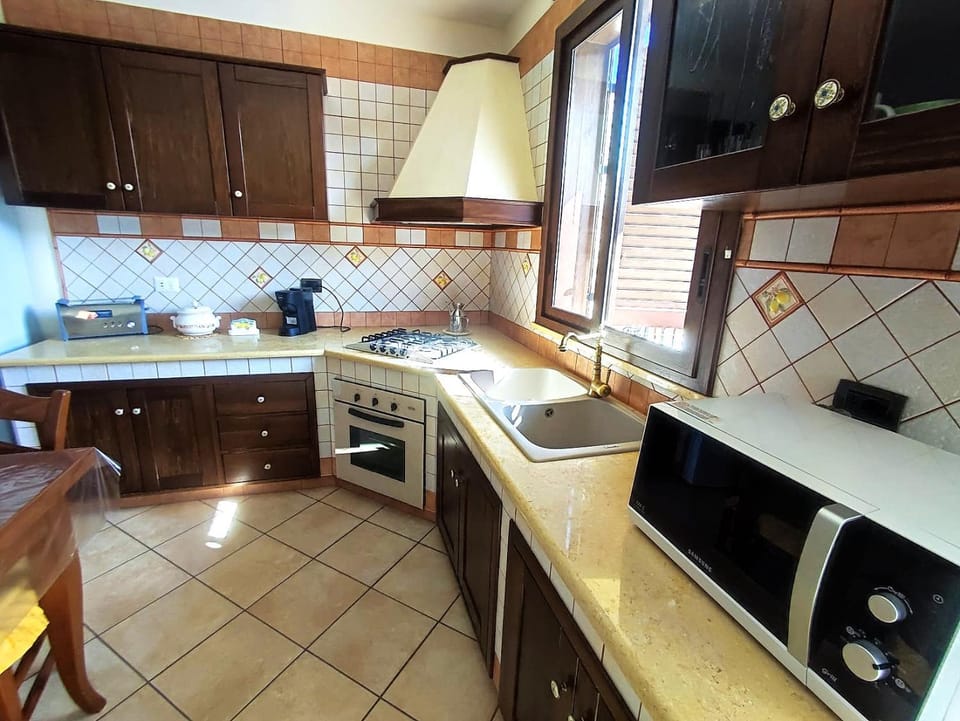 Kitchen or kitchenette, stove, toaster