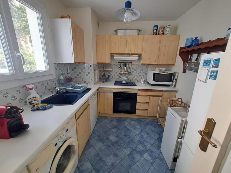 Kitchen or kitchenette, dishwasher, oven, stove, washing machine, dryer