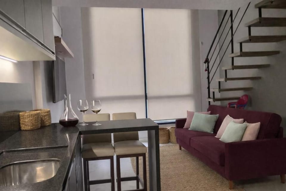 Kitchen or kitchenette, Living room, Seating area, Dining area