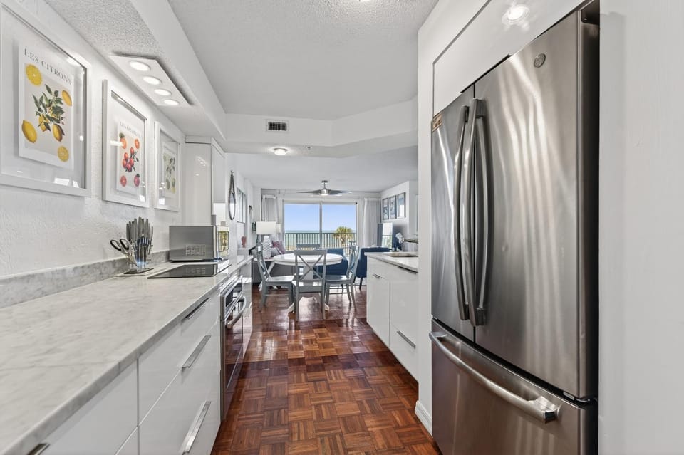 Ground floor direct oceanfront 2/2 with a balcony, heated pool, and garage parking Apartment in Ormond By The Sea