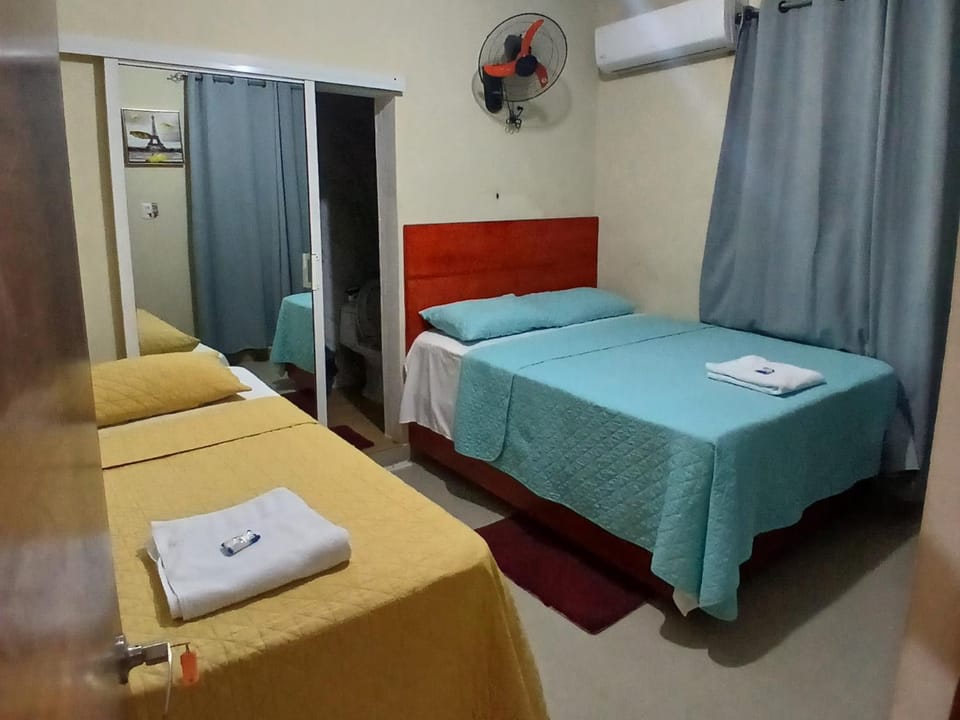 Bed, Photo of the whole room, Bedroom, towels, air conditioner