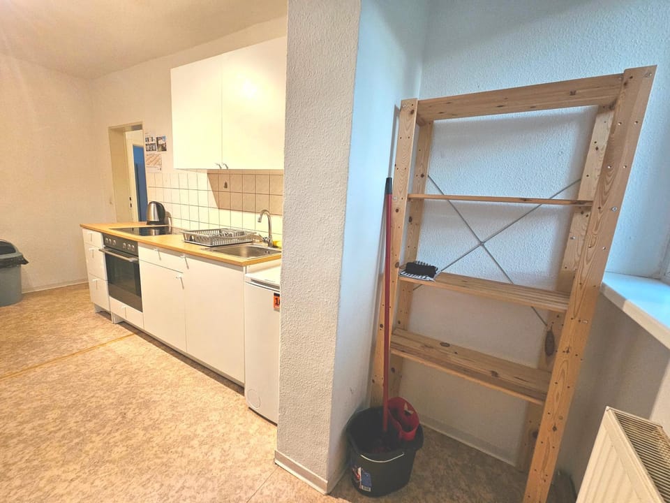 Kitchen or kitchenette, stove