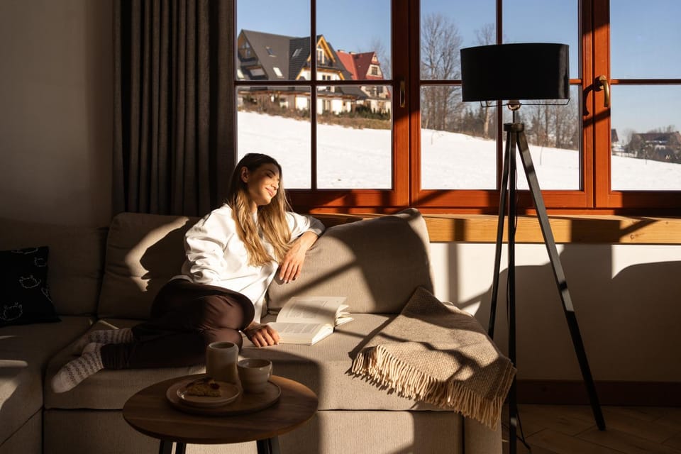 People, View (from property/room), Living room, Seating area, Mountain view, group of guests