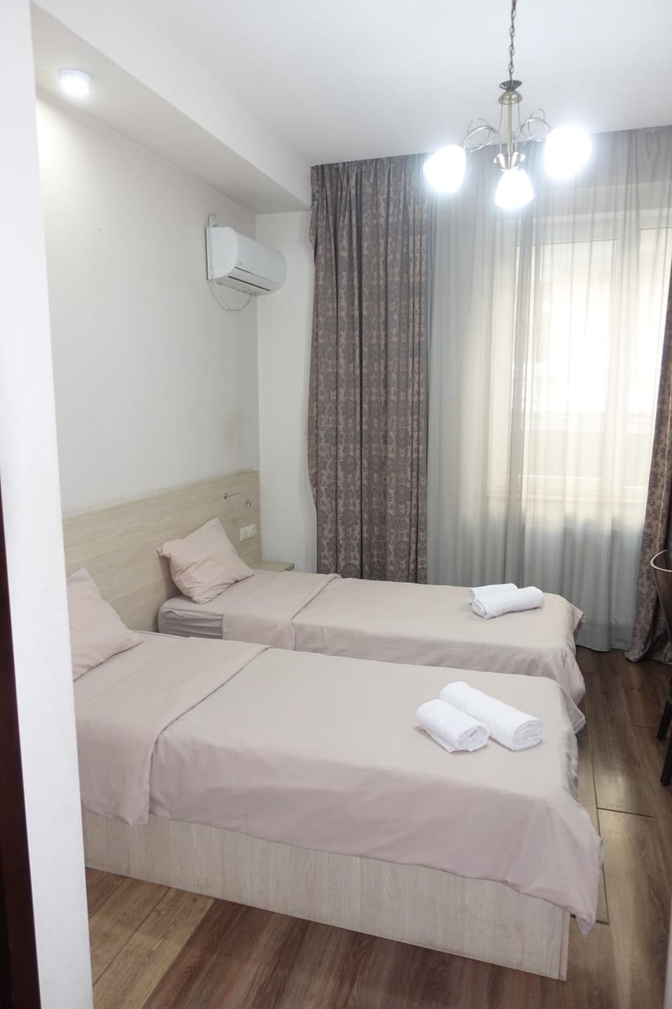 Bed, Photo of the whole room, Bedroom, towels, air conditioner