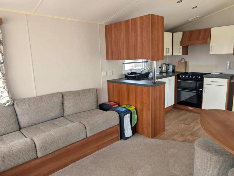 Kitchen or kitchenette, Living room, Seating area, Dining area, oven, stove, toaster