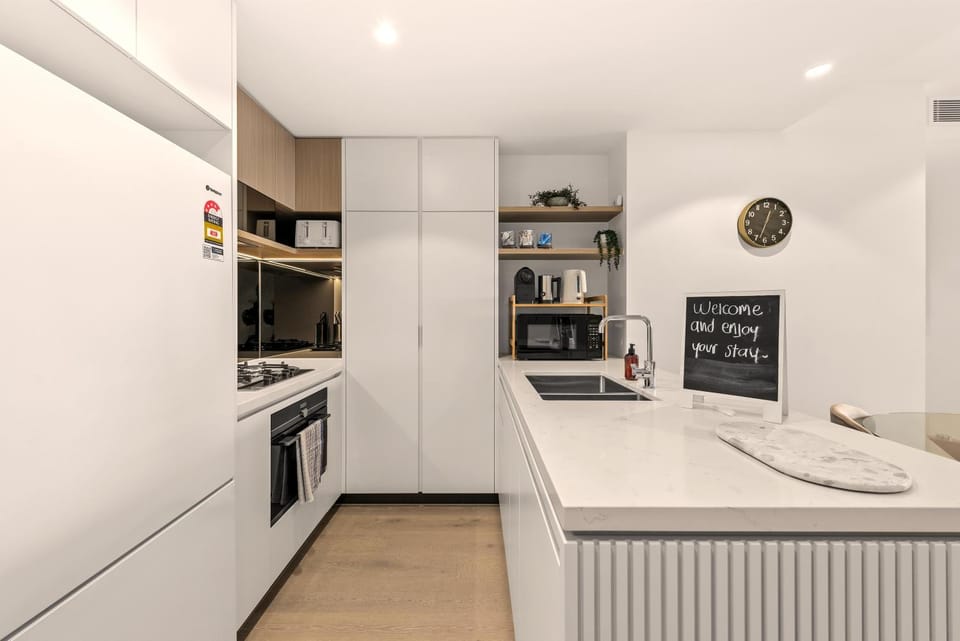 Kitchen or kitchenette, dishwasher, oven, stove, toaster