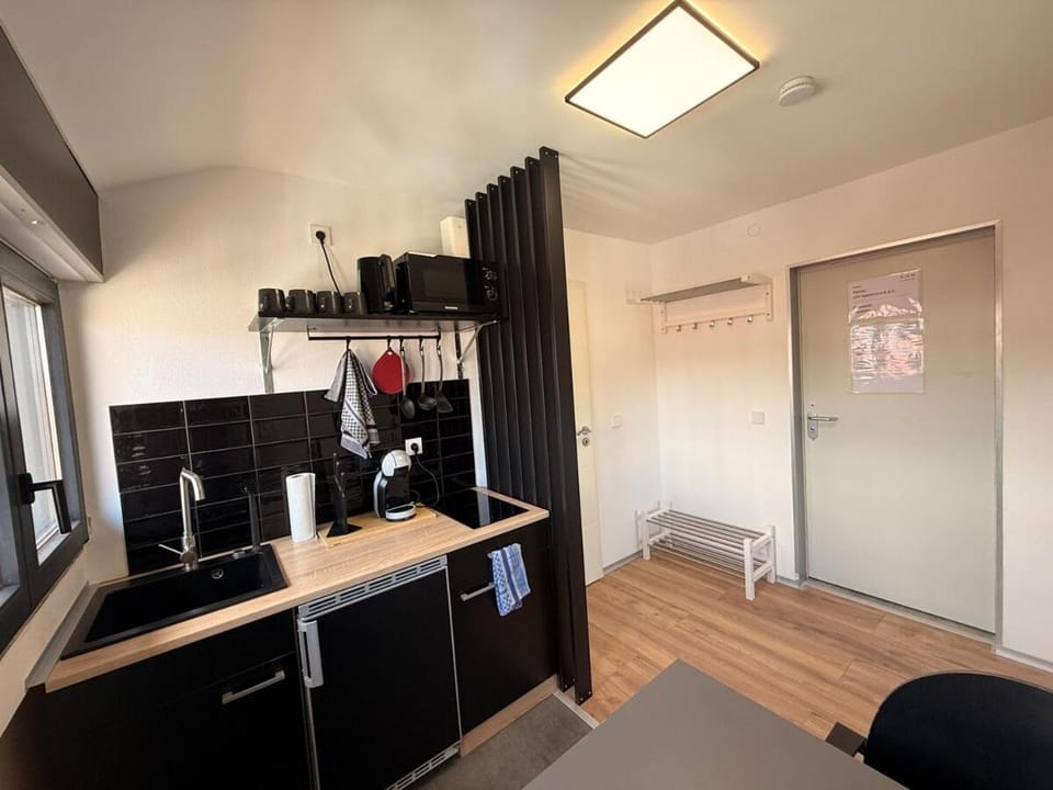 Kitchen or kitchenette, stove