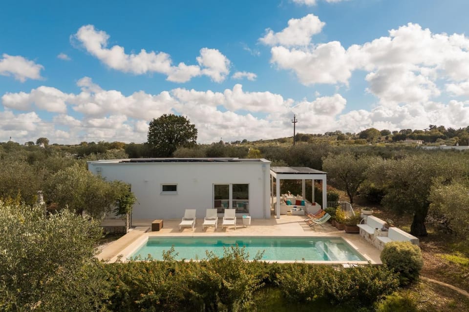 Property building, Living room, Swimming pool