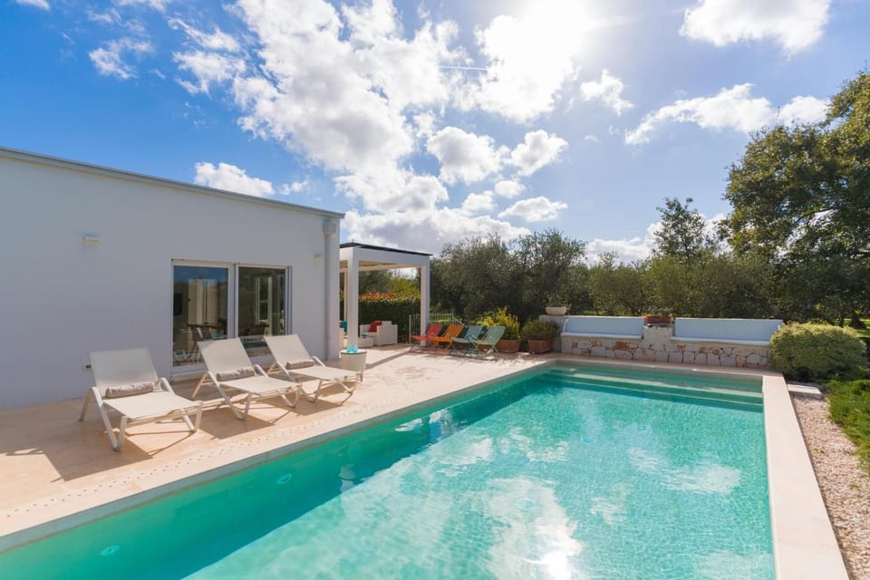 Property building, Living room, Swimming pool