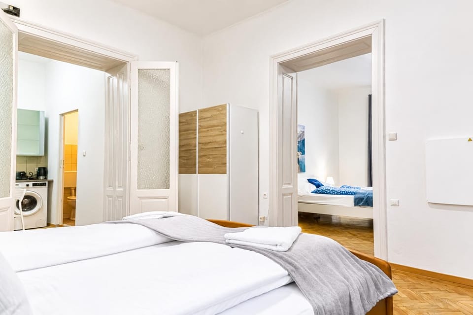 Bed, Bedroom, towels, wardrobe, washing machine