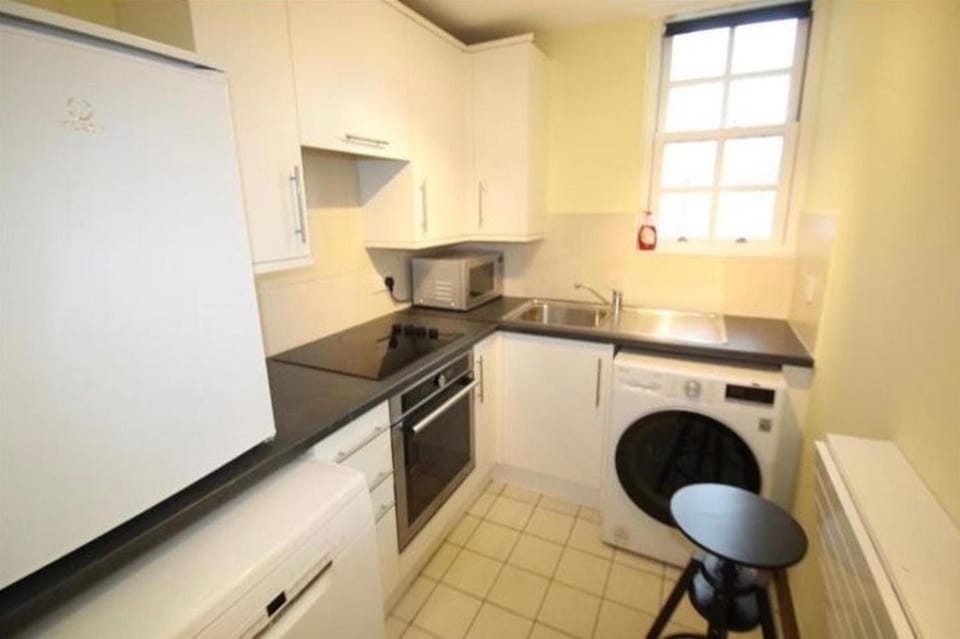 Kitchen or kitchenette, microwave, oven, stove, toaster
