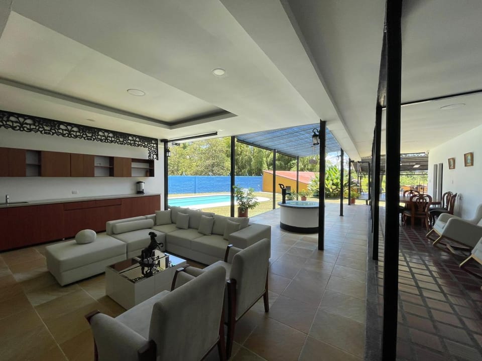 Living room, Seating area, Pool view, Swimming pool