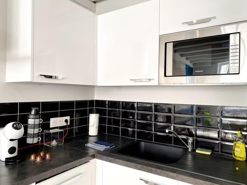 Kitchen or kitchenette, stove, toaster