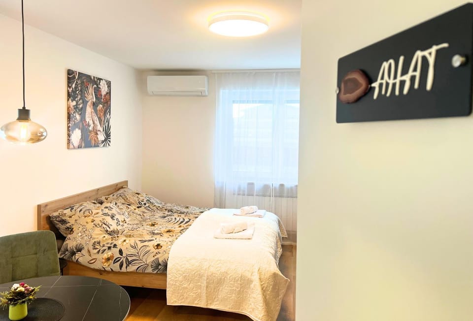 Bed, Photo of the whole room, Bedroom, towels, air conditioner