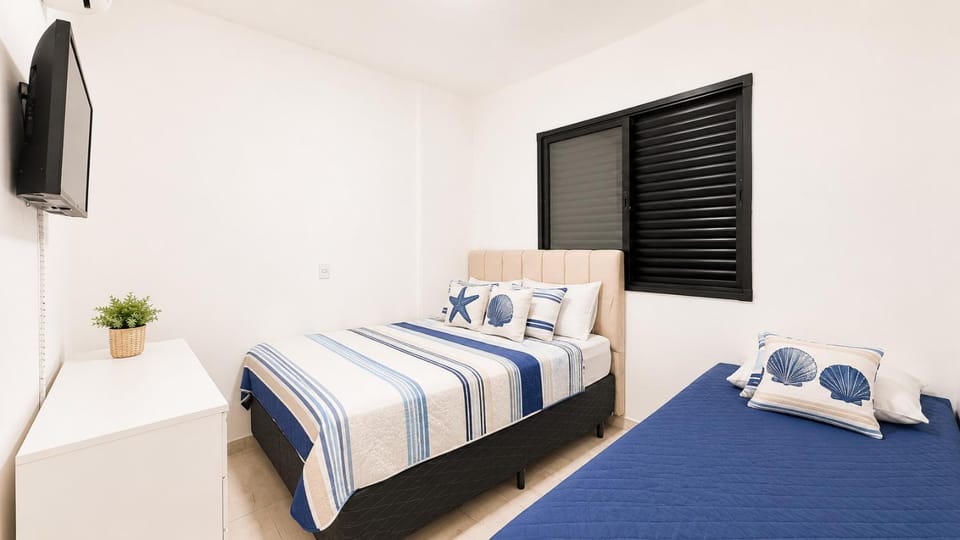 Bed, TV and multimedia, locker, air conditioner
