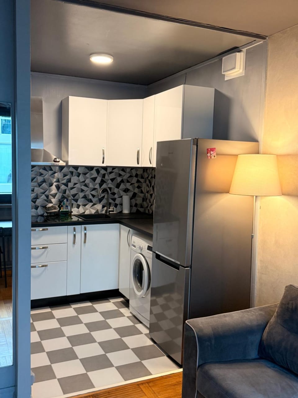 Kitchen or kitchenette, dishwasher, stove, washing machine