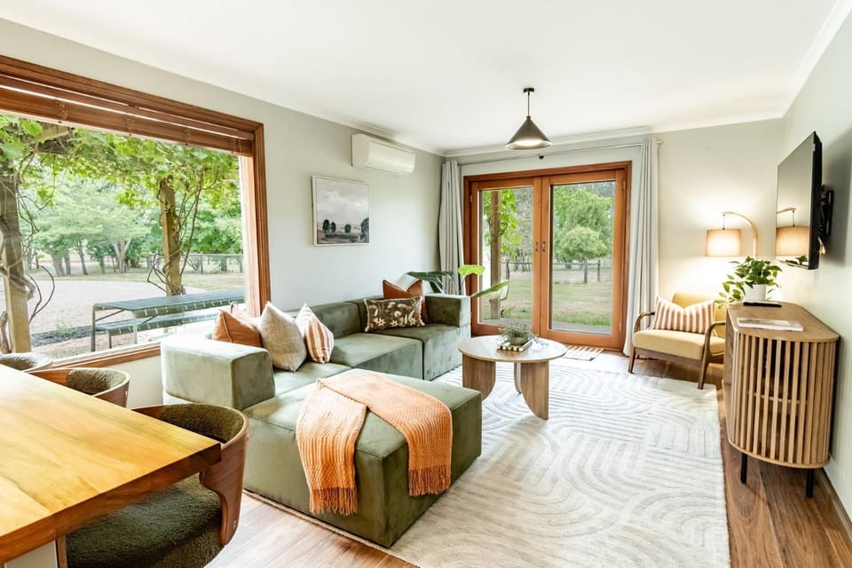 TV and multimedia, Living room, Seating area, Garden view, air conditioner