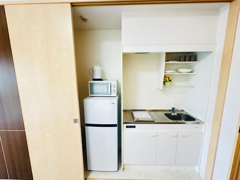 Kitchen or kitchenette, stove