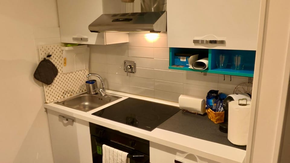 Kitchen or kitchenette, stove