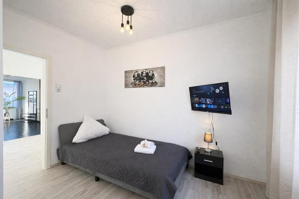 Business Apartment Ennigerloh I 6 Einzelbetten I 2 Bäder I Smart TV Apartment in North Rhine-Westphalia