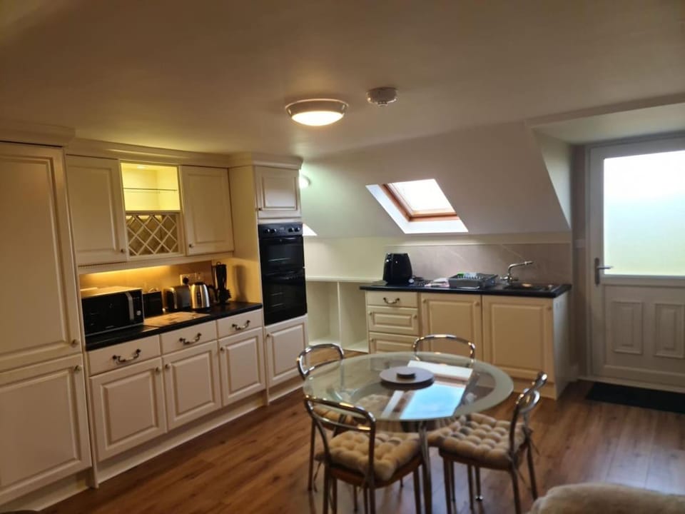 Kitchen or kitchenette, Dining area, dishwasher, oven, stove, toaster