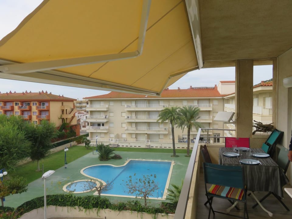 Property building, Living room, Swimming pool