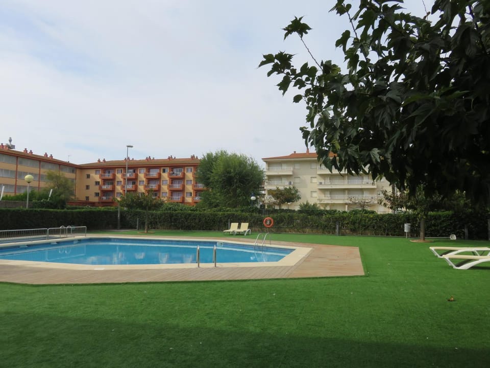 Property building, Living room, Swimming pool