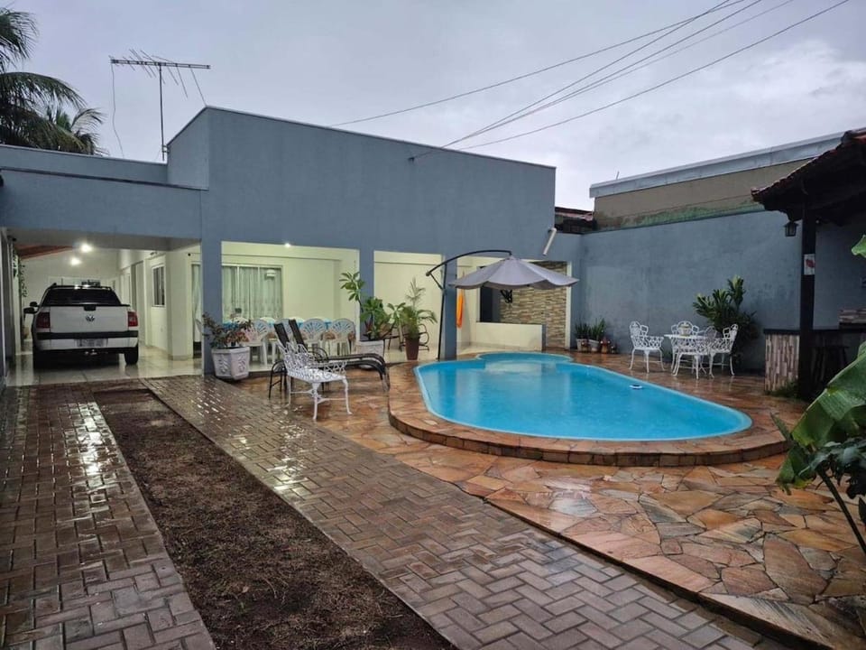 Property building, Patio, Day, Pool view, Swimming pool, Parking, sunbed