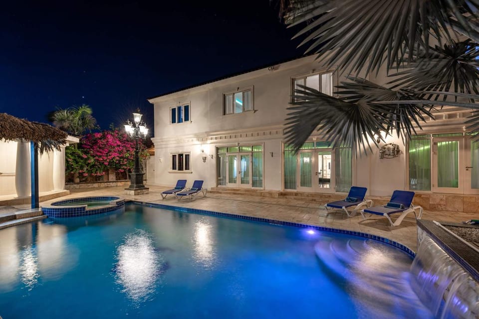 Property building, Patio, Night, Pool view, Swimming pool, sunbed