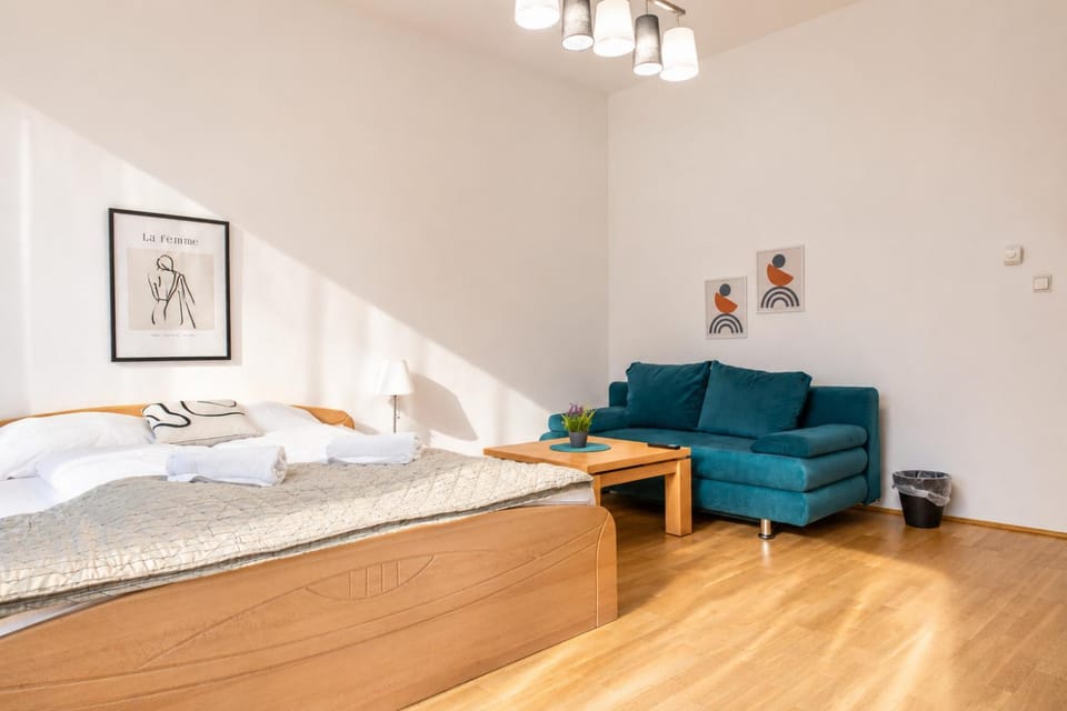 Bed, Living room, Seating area, Bedroom