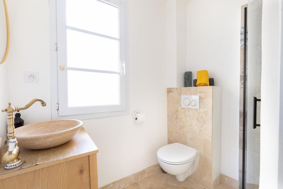 Toilet, Bathroom, flat iron, hair dryier, towels