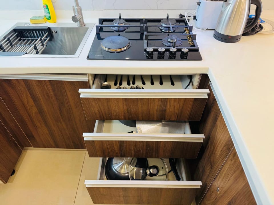 Kitchen or kitchenette, dishwasher, stove, kitchen