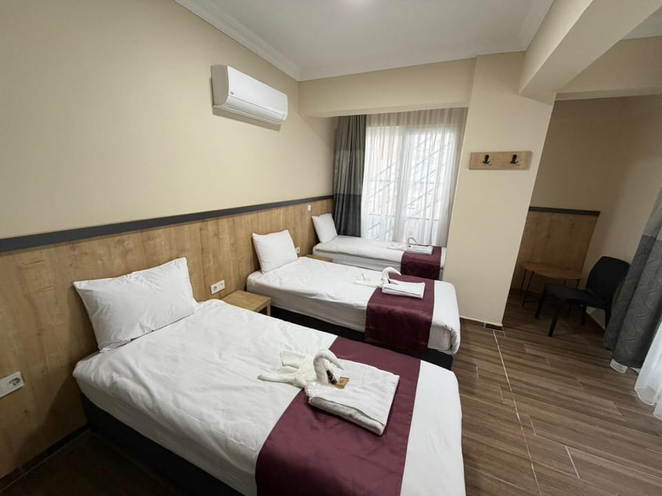 Bed, Photo of the whole room, Bedroom, towels, air conditioner