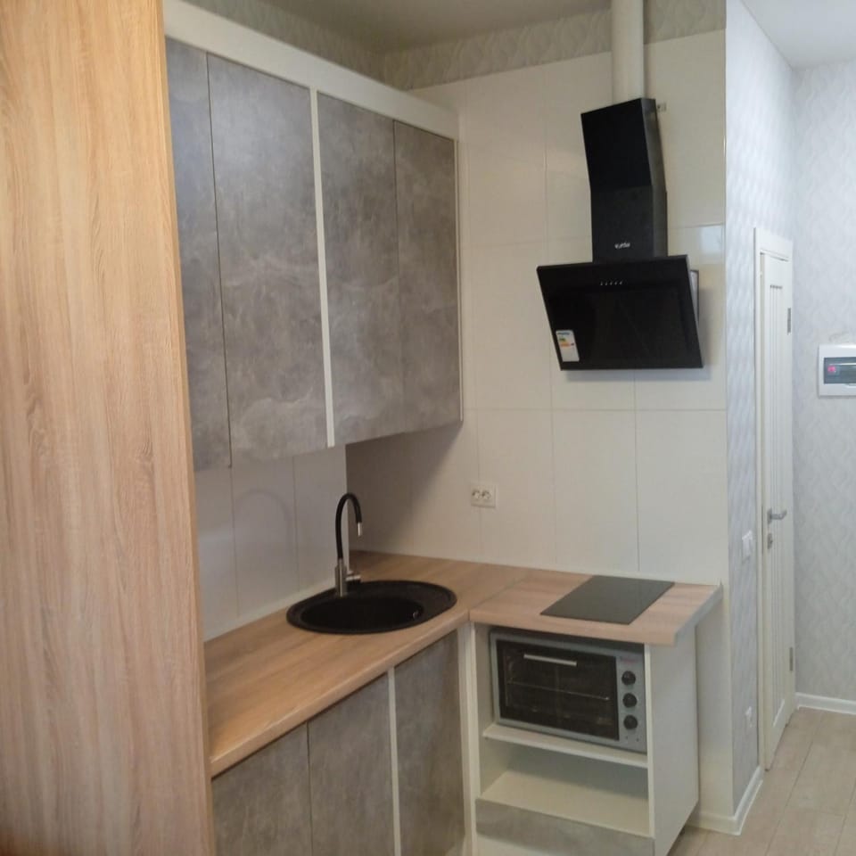 Kitchen or kitchenette, oven, stove