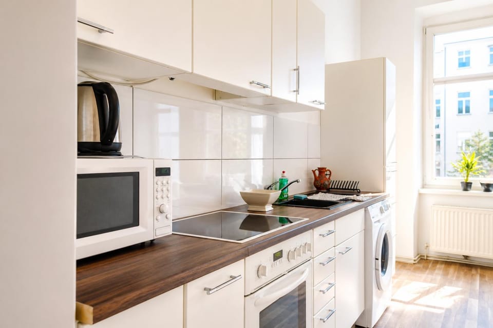 Kitchen or kitchenette, oven, stove
